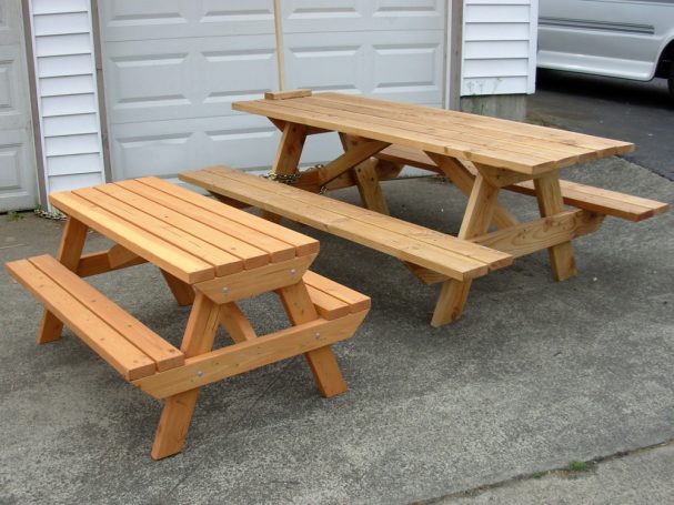 Commercial quality Eco-friendly Outdoor Kids Attached Bench Picnic Table next to full-sized attached bench picnic table.