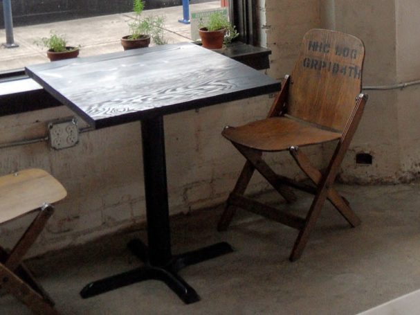 Small commercial quality Douglas Fir Table Top dining table at a restaurant bar.