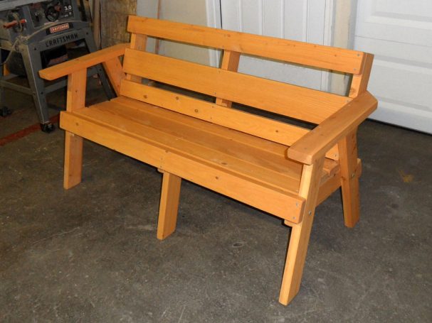 Reddish orange 5' Commercial quality eco-friendly Outdoor Park Bench slanted to the left.