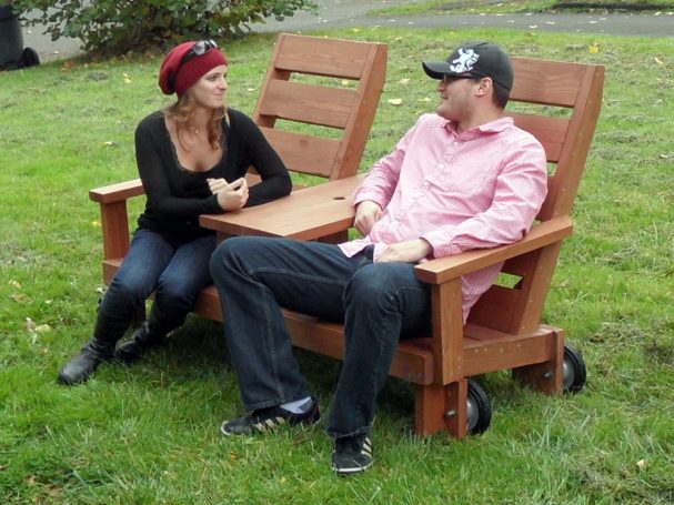 Custom 5' Commercial quality eco-friendly Outdoor Park Bench with center table and wheels with people.